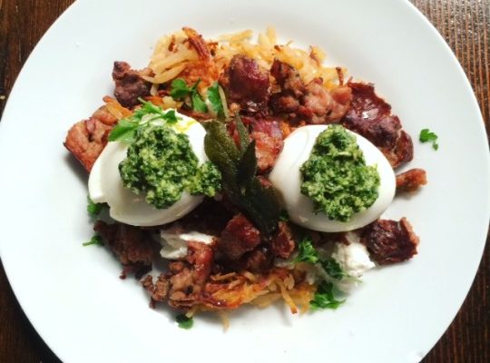 Hashbrown cups with chicken sausage, soft boiled eggs, burrata and pesto.